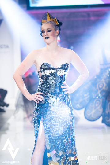 Queen Gold & Silver sequin dress on the podium